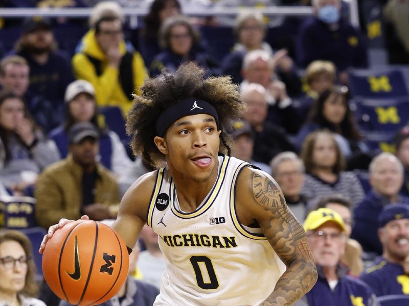 Feb 8, 2023; Ann Arbor, Michigan, USA;  Michigan Wolverines guard Dug McDaniel (0) dribbles in the first half against the Nebraska Cornhuskers at Crisler Center. Mandatory Credit: Rick Osentoski-USA TODAY Sports