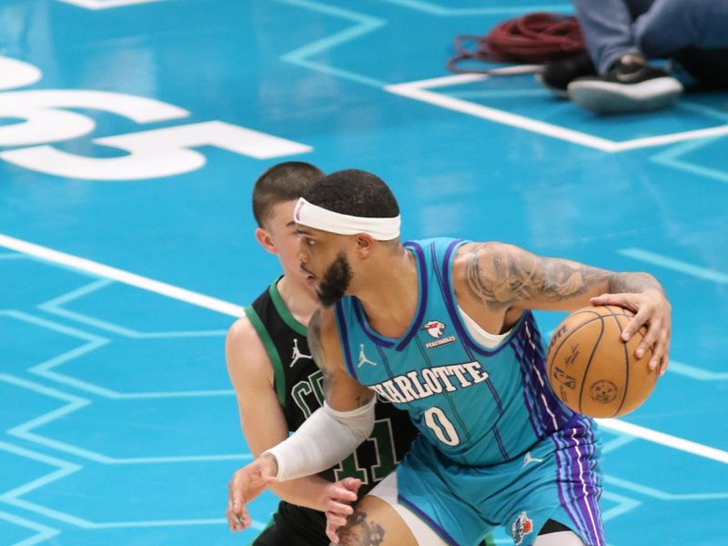 CHARLOTTE, NC - APRIL 1: Miles Bridges #0 of the Charlotte Hornets handles the ball during the game against the Boston Celtics on April 1, 2024 at Spectrum Center in Charlotte, North Carolina. NOTE TO USER: User expressly acknowledges and agrees that, by downloading and or using this photograph, User is consenting to the terms and conditions of the Getty Images License Agreement.  Mandatory Copyright Notice:  Copyright 2024 NBAE (Photo by Brock Williams-Smith/NBAE via Getty Images)