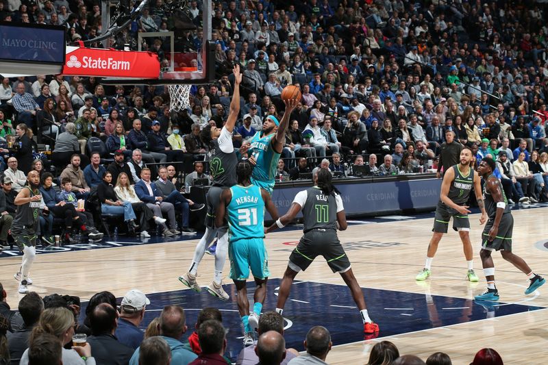 MINNEAPOLIS, MN -  JANUARY 22: Miles Bridges #0 of the Charlotte Hornets shoots the ball during the game against the Minnesota Timberwolves on January 22, 2024 at Target Center in Minneapolis, Minnesota. NOTE TO USER: User expressly acknowledges and agrees that, by downloading and or using this Photograph, user is consenting to the terms and conditions of the Getty Images License Agreement. Mandatory Copyright Notice: Copyright 2024 NBAE (Photo by David Sherman/NBAE via Getty Images)