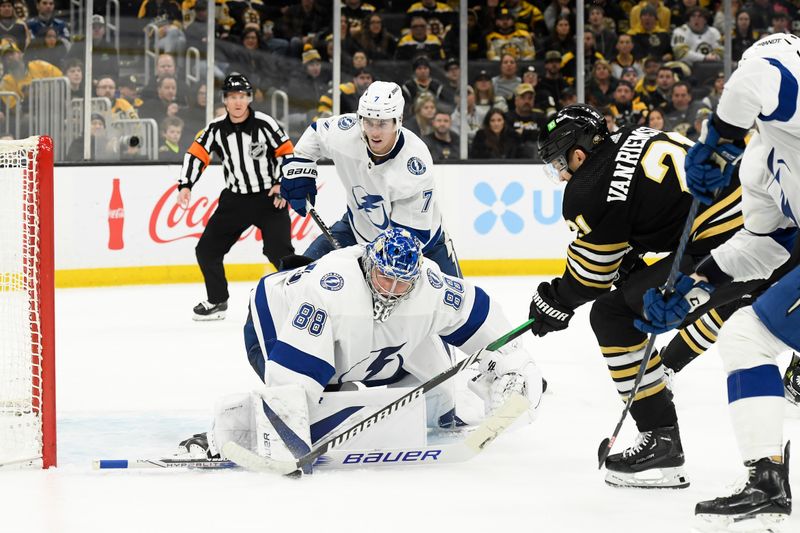 Feb 13, 2024; Boston, Massachusetts, USA;  Tampa Bay Lightning goaltender Andrei Vasilevskiy (88) makes a save on Boston Bruins left wing James van Riemsdyk (21) during the third period at TD Garden. Mandatory Credit: Bob DeChiara-USA TODAY Sports