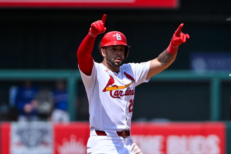 Jul 31, 2024; St. Louis, Missouri, USA;  St. Louis Cardinals right fielder Tommy Pham (29) reacts after hitting a two run double against the Texas Rangers during the fifth inning at Busch Stadium. Mandatory Credit: Jeff Curry-USA TODAY Sports