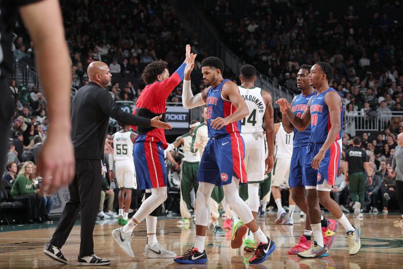 MILWAUKEE, WI - NOVEMBER 13: Head Coach J.B. Bickerstaff and Tobias Harris #12 of the Detroit Pistons high five during the game against the Milwaukee Bucks on November 13, 2024 at the Fiserv Forum Center in Milwaukee, Wisconsin. NOTE TO USER: User expressly acknowledges and agrees that, by downloading and or using this Photograph, user is consenting to the terms and conditions of the Getty Images License Agreement. Mandatory Copyright Notice: Copyright 2024 NBAE (Photo by Gary Dineen/NBAE via Getty Images).