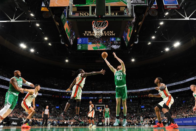 BOSTON, MA - DECEMBER 4: Luke Kornet #40 of the Boston Celtics drives to the basket during the game against the Detroit Pistons on December 4, 2024 at TD Garden in Boston, Massachusetts. NOTE TO USER: User expressly acknowledges and agrees that, by downloading and/or using this Photograph, user is consenting to the terms and conditions of the Getty Images License Agreement. Mandatory Copyright Notice: Copyright 2024 NBAE (Photo by Brian Babineau/NBAE via Getty Images)