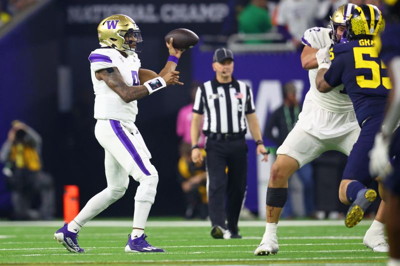 Jan 8, 2024; Houston, TX, USA; Washington Huskies quarterback Michael Penix Jr. (9) passes the ball against the Michigan Wolverines during the second quarter in the 2024 College Football Playoff national championship game at NRG Stadium. Mandatory Credit: Mark J. Rebilas-USA TODAY Sports