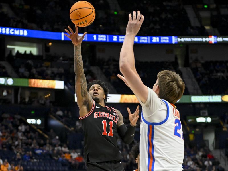 Mar 14, 2024; Nashville, TN, USA;  Georgia Bulldogs guard Justin Hill (11) shoots over Florida Gators guard Riley Kugel (2) during the first half at Bridgestone Arena. Mandatory Credit: Steve Roberts-USA TODAY Sports