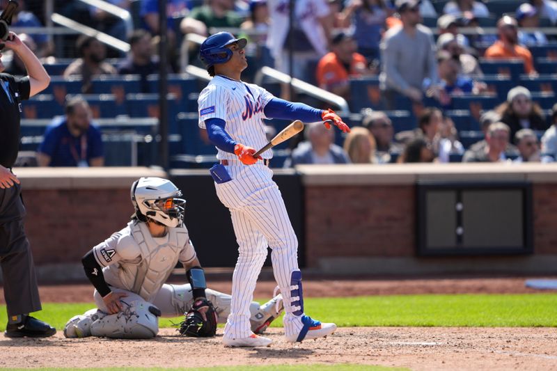 May 1, 2025; New York City, New York, USA; New York Mets right fielder Juan Soto (22) watches his second home run of the game against the Arizona Diamondbacks during the eighth inning at Citi Field. Mandatory Credit: Gregory Fisher-Imagn Images