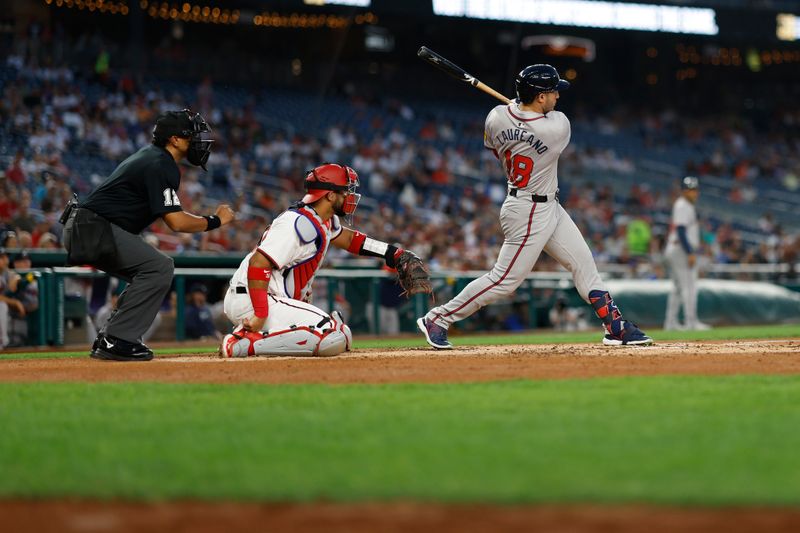 Sep 10, 2024; Washington, District of Columbia, USA; Atlanta Braves outfielder Ramón Laureano (18) hits a two run double against the Washington Nationals during the third inning at Nationals Park. Mandatory Credit: Geoff Burke-Imagn Images