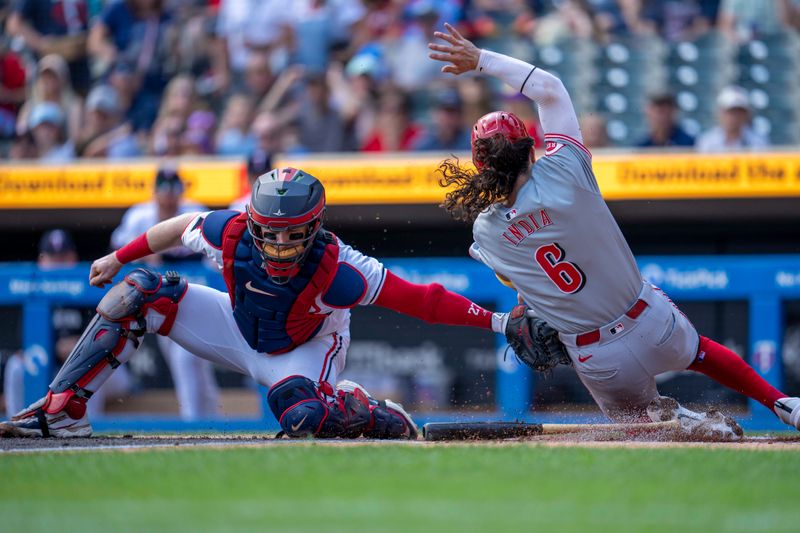 Sep 15, 2024; Minneapolis, Minnesota, USA; Minnesota Twins catcher Ryan Jeffers (27) tags out Cincinnati Reds second baseman Jonathan India (6) at home plate in the first inning at Target Field. Mandatory Credit: Jesse Johnson-Imagn Images