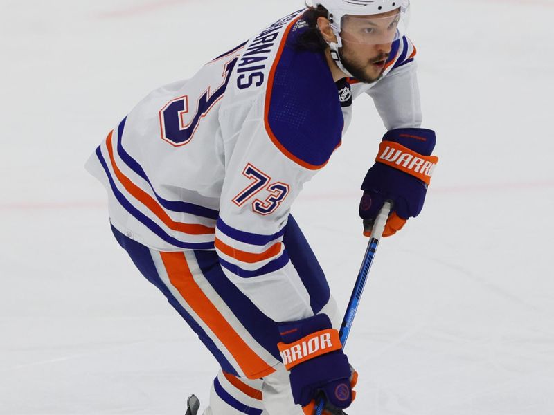 Jun 10, 2024; Sunrise, Florida, USA; Edmonton Oilers defenseman Vincent Desharnais (73) controls the puck during the first period against the Florida Panthers in game two of the 2024 Stanley Cup Final at Amerant Bank Arena. Mandatory Credit: Sam Navarro-USA TODAY Sports