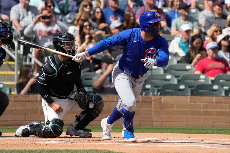 Mar 8, 2024; Salt River Pima-Maricopa, Arizona, USA; Chicago Cubs center fielder Mike Tauchman (40) hits against the Arizona Diamondbacks in the first inning at Salt River Fields at Talking Stick. Mandatory Credit: Rick Scuteri-USA TODAY Sports