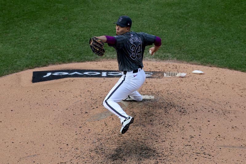 May 31, 2025; New York City, New York, USA; New York Mets starting pitcher Kodai Senga (34) pitches against the Colorado Rockies during the seventh inning at Citi Field. Mandatory Credit: Brad Penner-Imagn Images
