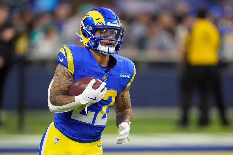 Los Angeles Rams running back Blake Corum warms up prior to an NFL football game against the Miami Dolphins, Monday, Nov. 11, 2024, in Inglewood, Calif. (AP Photo/Marcio Jose Sanchez)