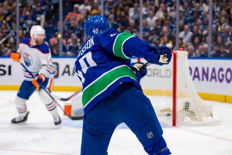 May 10, 2024; Vancouver, British Columbia, CAN; Vancouver Canucks forward Elias Pettersson (40) scores on this shot against the Edmonton Oilers during the first period in game two of the second round of the 2024 Stanley Cup Playoffs at Rogers Arena. Mandatory Credit: Bob Frid-USA TODAY Sports