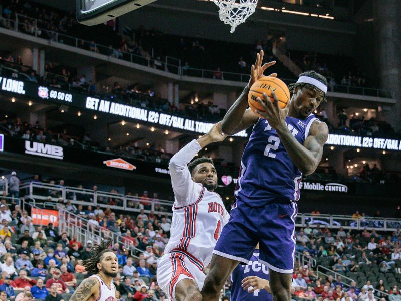 Mar 14, 2024; Kansas City, MO, USA; TCU Horned Frogs forward Emanuel Miller (2) grabs a rebound during the first half against the TCU Horned Frogs at T-Mobile Center. Mandatory Credit: William Purnell-USA TODAY Sports