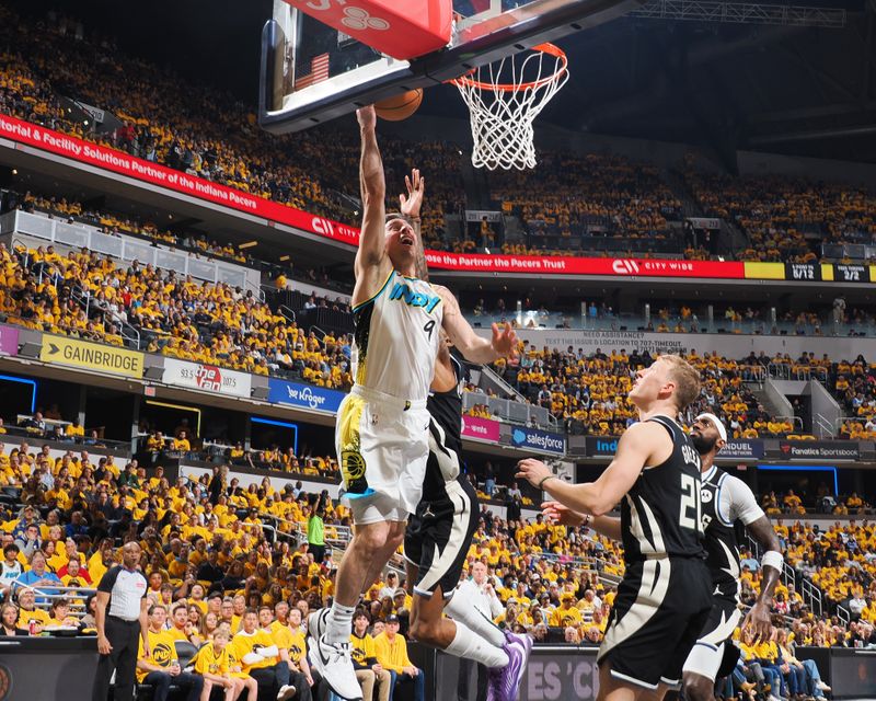INDIANAPOLIS, IN - APRIL 19: T.J. McConnell #9 of the Indiana Pacers shoots the ball during the game against the Milwaukee Bucks during Round 1 Game 1 of the 2025 NBA Playoffs on April 19, 2025 at Gainbridge Fieldhouse in Indianapolis, Indiana. NOTE TO USER: User expressly acknowledges and agrees that, by downloading and or using this Photograph, user is consenting to the terms and conditions of the Getty Images License Agreement. Mandatory Copyright Notice: Copyright 2025 NBAE (Photo by Ron Hoskins/NBAE via Getty Images)