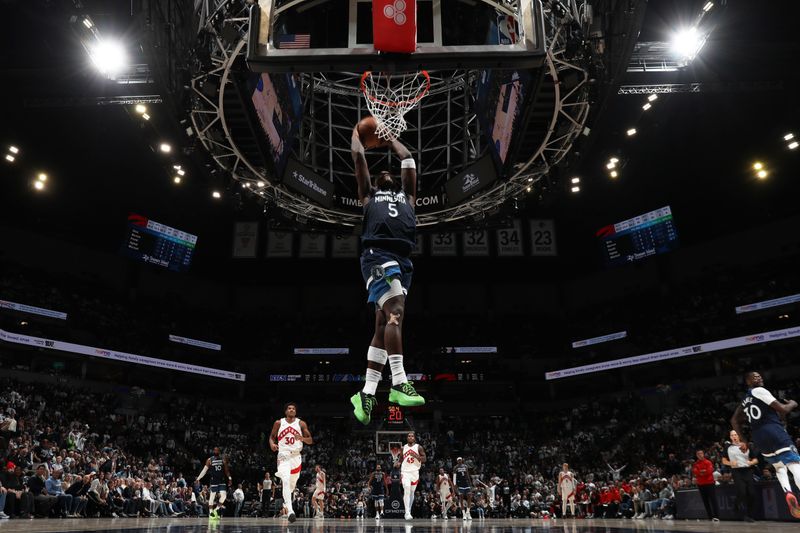 MINNEAPOLIS, MN -  OCTOBER 22: Anthony Edwards #5 of the Minnesota Timberwolves dunks the ball during the game against the Toronto Raptors on October 22, 2024 at Target Center in Minneapolis, Minnesota. NOTE TO USER: User expressly acknowledges and agrees that, by downloading and or using this Photograph, user is consenting to the terms and conditions of the Getty Images License Agreement. Mandatory Copyright Notice: Copyright 2024 NBAE (Photo by Jordan Johnson/NBAE via Getty Images)