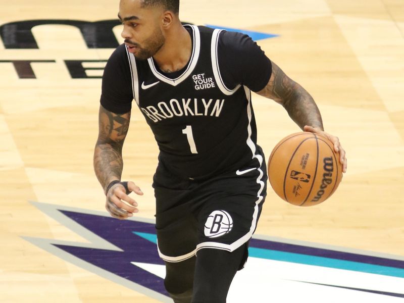 CHARLOTTE, NC - JANUARY 29: D'Angelo Russell #1 of the Brooklyn Nets dribbles the ball during the game against the Charlotte Hornets  on January 29, 2025 at Spectrum Center in Charlotte, North Carolina. NOTE TO USER: User expressly acknowledges and agrees that, by downloading and or using this photograph, User is consenting to the terms and conditions of the Getty Images License Agreement. Mandatory Copyright Notice: Copyright 2025 NBAE (Photo by Brock Williams-Smith/NBAE via Getty Images)