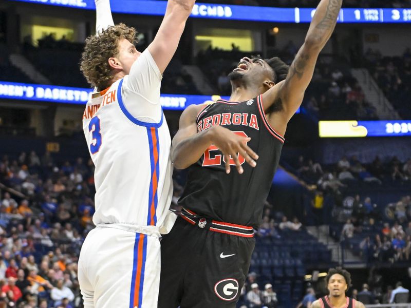 Mar 14, 2024; Nashville, TN, USA;  Georgia Bulldogs forward Jalen DeLoach (23) shoots over Florida Gators center Micah Handlogten (3) during the first half at Bridgestone Arena. Mandatory Credit: Steve Roberts-USA TODAY Sports