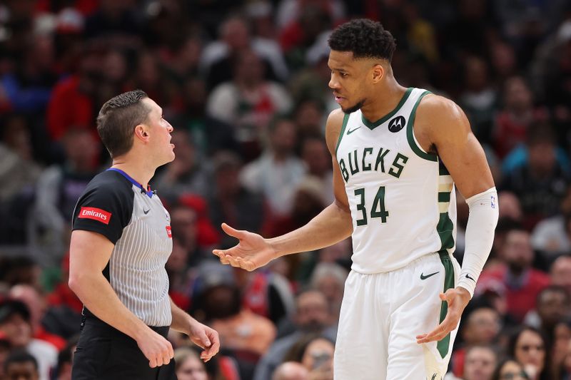 CHICAGO, ILLINOIS - MARCH 01: Giannis Antetokounmpo #34 of the Milwaukee Bucks argues a foul call with referee JB DeRosa #22 against the Chicago Bulls during the first half at the United Center on March 01, 2024 in Chicago, Illinois. NOTE TO USER: User expressly acknowledges and agrees that, by downloading and or using this photograph, User is consenting to the terms and conditions of the Getty Images License Agreement. (Photo by Michael Reaves/Getty Images)