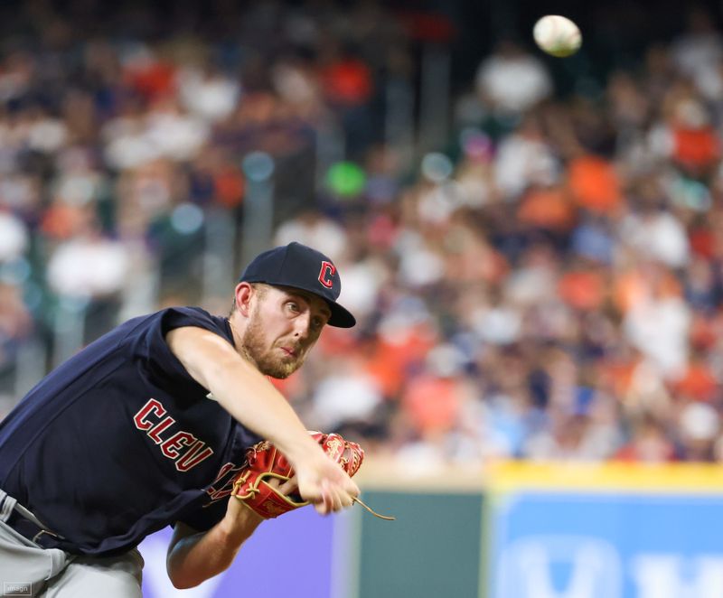 Aug 2, 2023; Houston, Texas, USA; Cleveland Guardians starting pitcher Tanner Bibee (61) pitches against the Houston Astros in the second inning  at Minute Maid Park. Mandatory Credit: Thomas Shea-USA TODAY Sports