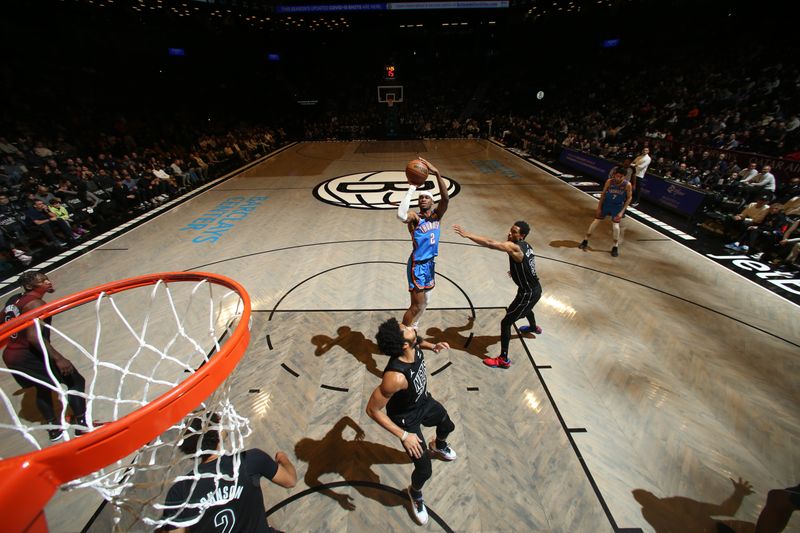 BROOKLYN, NY - JANUARY 5: Shai Gilgeous-Alexander #2 of the Oklahoma City Thunder shoots the ball during the game  on January 5, 2024 at Barclays Center in Brooklyn, New York. NOTE TO USER: User expressly acknowledges and agrees that, by downloading and or using this Photograph, user is consenting to the terms and conditions of the Getty Images License Agreement. Mandatory Copyright Notice: Copyright 2024 NBAE (Photo by Nathaniel S. Butler/NBAE via Getty Images)