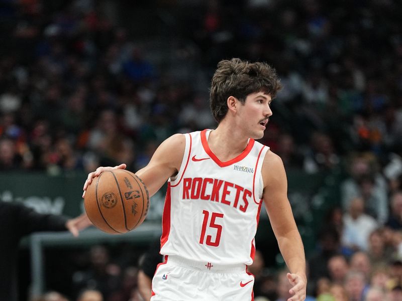 DALLAS, TX - OCTOBER 31: Reed Sheppard #15 of the Houston Rockets dribbles the ball during the game against the Dallas Mavericks on October 31, 2024 at American Airlines Center in Dallas, Texas. NOTE TO USER: User expressly acknowledges and agrees that, by downloading and or using this photograph, User is consenting to the terms and conditions of the Getty Images License Agreement. Mandatory Copyright Notice: Copyright 2024 NBAE (Photo by Glenn James/NBAE via Getty Images)