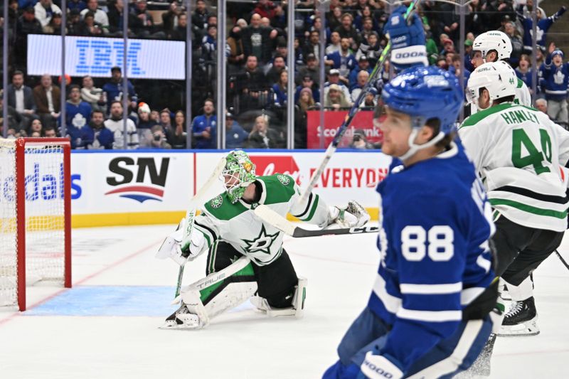 Feb 7, 2024; Toronto, Ontario, CAN; Dallas Stars goalie Scott Wedgewood looks toward his net after being beaten for a goal by Toronto Maple Leafs forward William Nylander (88) in the third period at Scotiabank Arena. Mandatory Credit: Dan Hamilton-USA TODAY Sports