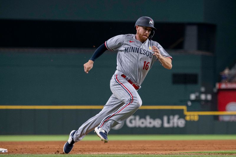 Sep 3, 2023; Arlington, Texas, USA; Minnesota Twins left fielder Jordan Luplow (16) scores the tying run against the Texas Rangers during the eighth inning at Globe Life Field. Mandatory Credit: Jerome Miron-USA TODAY Sports