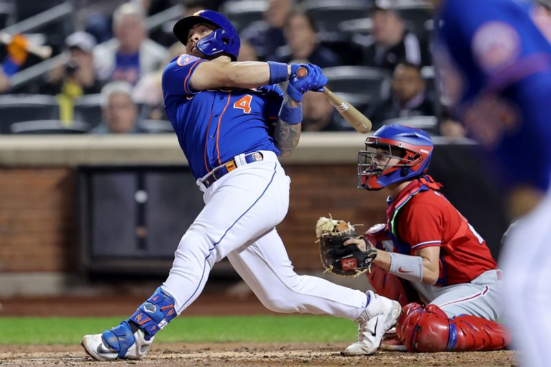 Sep 30, 2023; New York City, New York, USA; New York Mets catcher Francisco Alvarez (4) follows through on a grand slam home run against the Philadelphia Phillies during the third inning at Citi Field. Mandatory Credit: Brad Penner-USA TODAY Sports