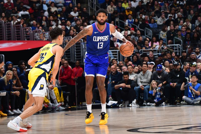 LOS ANGELES, CA - MARCH 25: Paul George #13 of the LA Clippers dribbles the ball during the game against the Indiana Pacers on March 25, 2024 at Crypto.Com Arena in Los Angeles, California. NOTE TO USER: User expressly acknowledges and agrees that, by downloading and/or using this Photograph, user is consenting to the terms and conditions of the Getty Images License Agreement. Mandatory Copyright Notice: Copyright 2024 NBAE (Photo by Adam Pantozzi/NBAE via Getty Images)