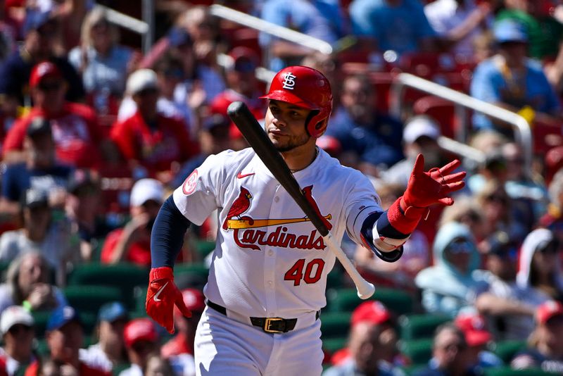 Aug 22, 2024; St. Louis, Missouri, USA;  St. Louis Cardinals catcher Willson Contreras (40) tosses his bat after drawing a walk with the bases loaded against the Milwaukee Brewers during the seventh inning at Busch Stadium. Mandatory Credit: Jeff Curry-USA TODAY Sports