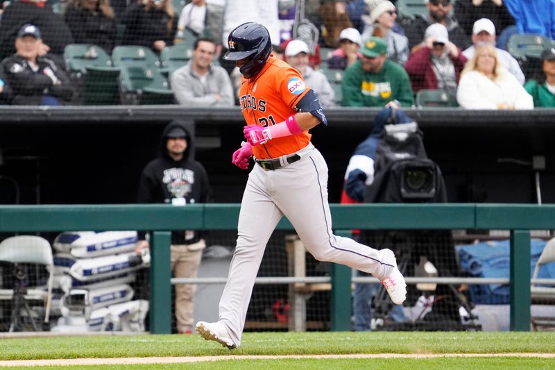 May 14, 2023; Chicago, Illinois, USA; Houston Astros designated hitter Yainer Diaz (21) runs the bases after hitting a home run against the Chicago White Sox during the fourth inning at Guaranteed Rate Field. Mandatory Credit: David Banks-USA TODAY Sports