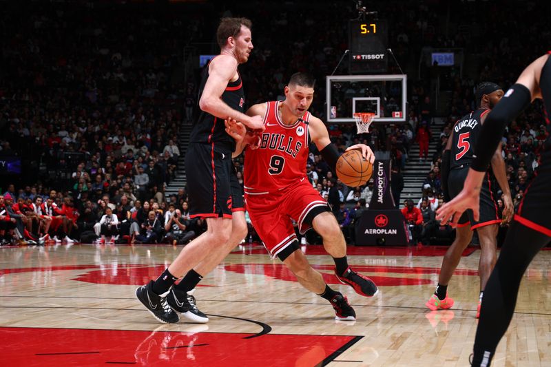 TORONTO, CANADA - JANUARY 31: Nikola Vucevic #9 of the Chicago Bulls dribbles the ball during the game against the Toronto Raptors   on January 31, 2025 at the Scotiabank Arena in Toronto, Ontario, Canada.  NOTE TO USER: User expressly acknowledges and agrees that, by downloading and or using this Photograph, user is consenting to the terms and conditions of the Getty Images License Agreement.  Mandatory Copyright Notice: Copyright 2025 NBAE (Photo by Vaughn Ridley/NBAE via Getty Images)