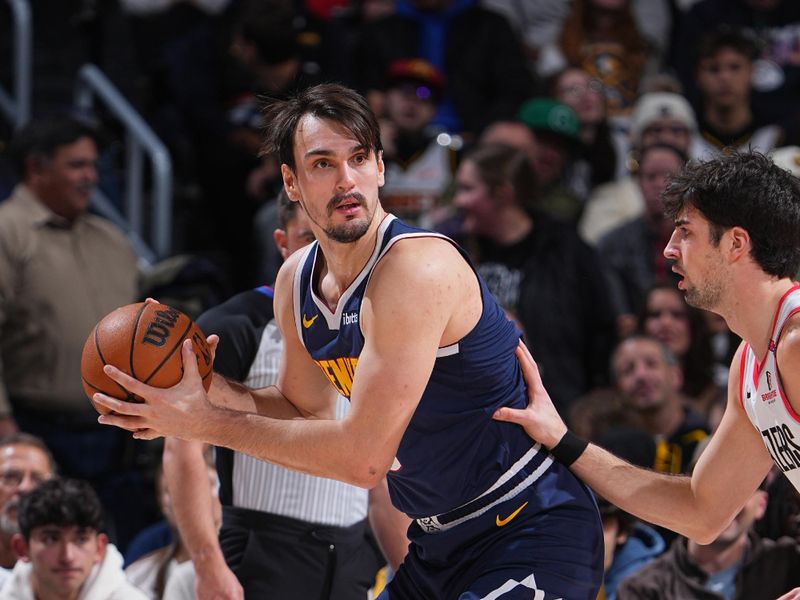 DENVER, CO - FEBRUARY 12:  Dario Saric #9 of the Denver Nuggets dribbles the ball during the game against the Portland Trail Blazers on February 12, 2025 at Ball Arena in Denver, Colorado. NOTE TO USER: User expressly acknowledges and agrees that, by downloading and/or using this Photograph, user is consenting to the terms and conditions of the Getty Images License Agreement. Mandatory Copyright Notice: Copyright 2025 NBAE (Photo by Garrett Ellwood/NBAE via Getty Images)