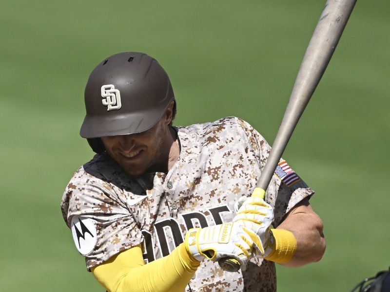 Sep 28, 2025; San Diego, California, USA; San Diego Padres right fielder Bryce Johnson (29) is hit with a pitch during the fifth inning against the Arizona Diamondbacks at Petco Park. Mandatory Credit: Denis Poroy-Imagn Images