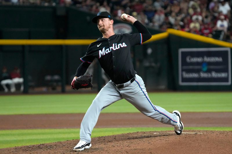 May 24, 2024; Phoenix, Arizona, USA; Miami Marlins pitcher Braxton Garrett (29) throws against the Arizona Diamondbacks in the eighth inning at Chase Field. Mandatory Credit: Rick Scuteri-USA TODAY Sports