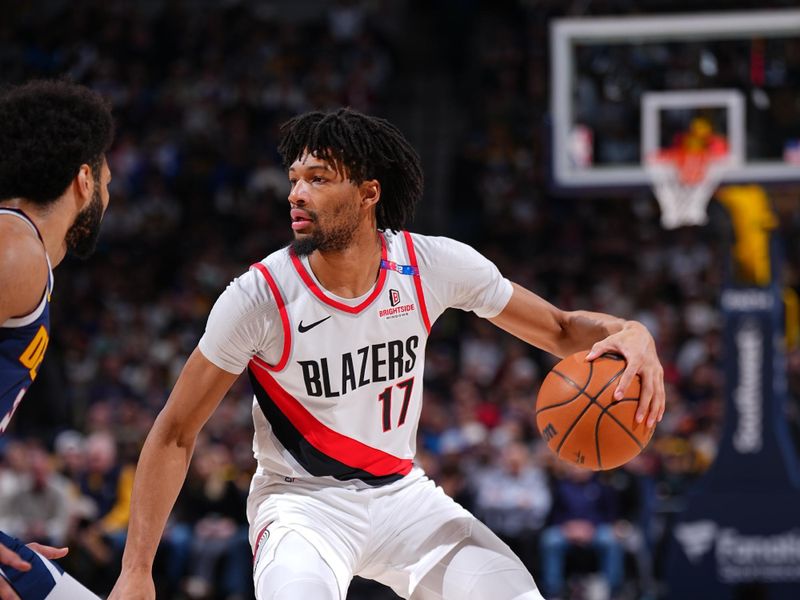 DENVER, CO - FEBRUARY 12:  Shaedon Sharpe #17 of the Portland Trail Blazers dribbles the ball during the game against the Denver Nuggets on February 12, 2025 at Ball Arena in Denver, Colorado. NOTE TO USER: User expressly acknowledges and agrees that, by downloading and/or using this Photograph, user is consenting to the terms and conditions of the Getty Images License Agreement. Mandatory Copyright Notice: Copyright 2025 NBAE (Photo by Garrett Ellwood/NBAE via Getty Images)