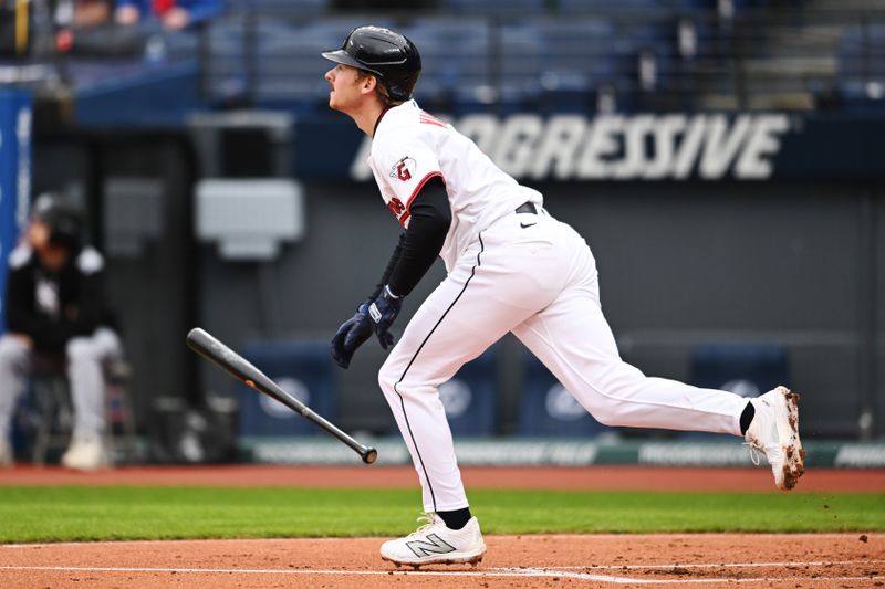 Apr 10, 2025; Cleveland, Ohio, USA; Cleveland Guardians first baseman Kyle Manzardo (9) hits a home run during the first inning against the Chicago White Sox at Progressive Field. Mandatory Credit: Ken Blaze-Imagn Images