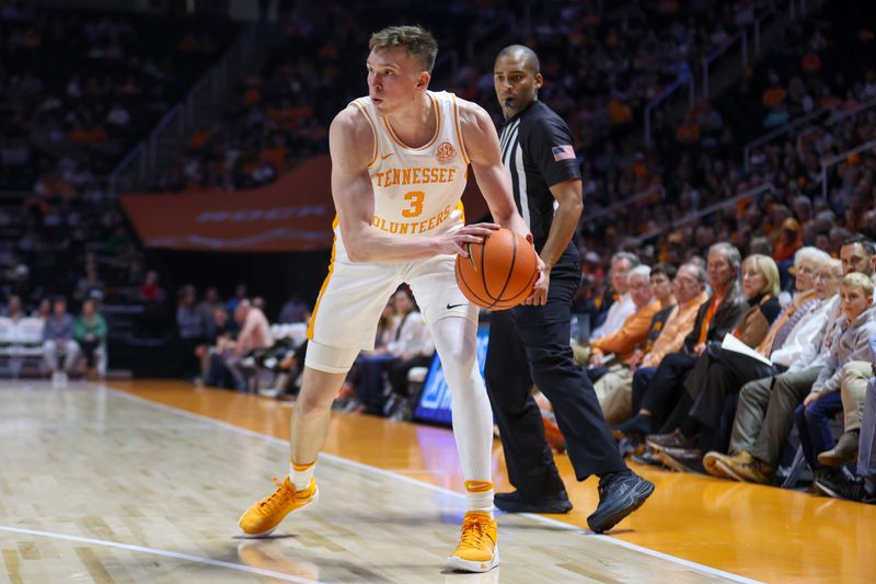 Dec 5, 2023; Knoxville, Tennessee, USA; Tennessee Volunteers guard Dalton Knecht (3) looks to move the ball against the George Mason Patriots during the second half at the Food City Arena at Thompson-Boling Arena. Mandatory Credit: Randy Sartin-USA TODAY Sports