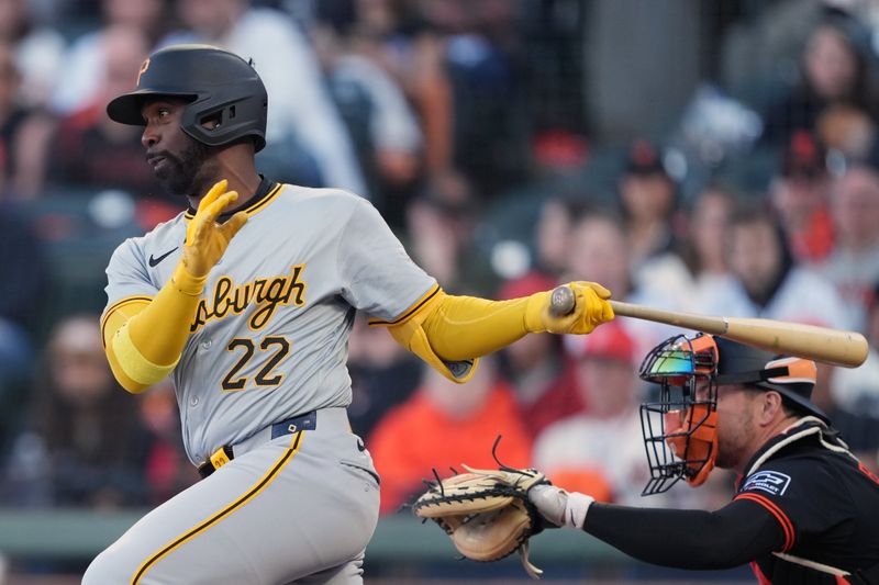 Apr 27, 2024; San Francisco, California, USA; Pittsburgh Pirates designated hitter Andrew McCutchen (22) hits a single against the San Francisco Giants during the fourth inning at Oracle Park. Mandatory Credit: Darren Yamashita-USA TODAY Sports