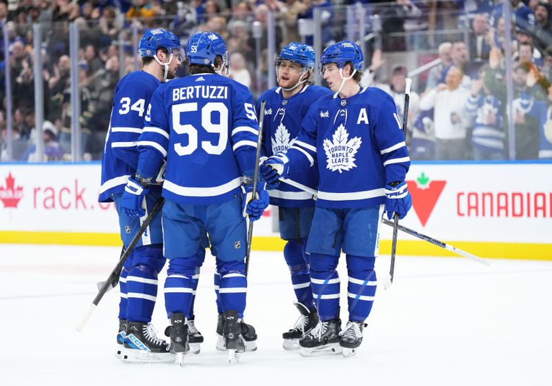 Feb 17, 2024; Toronto, Ontario, CAN; Toronto Maple Leafs right wing William Nylander (88) scores a goal and celebrates with right wing Mitchell Marner (16) against the Anaheim Ducks during the first period at Scotiabank Arena. Mandatory Credit: Nick Turchiaro-USA TODAY Sports