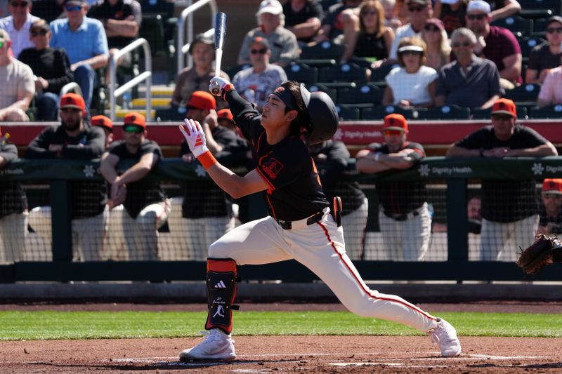 Mar 1, 2024; Scottsdale, Arizona, USA; San Francisco Giants outfielder Jung Hoo Lee (51) bats against the Texas Rangers during the first inning at Scottsdale Stadium. Mandatory Credit: Joe Camporeale-USA TODAY Sports