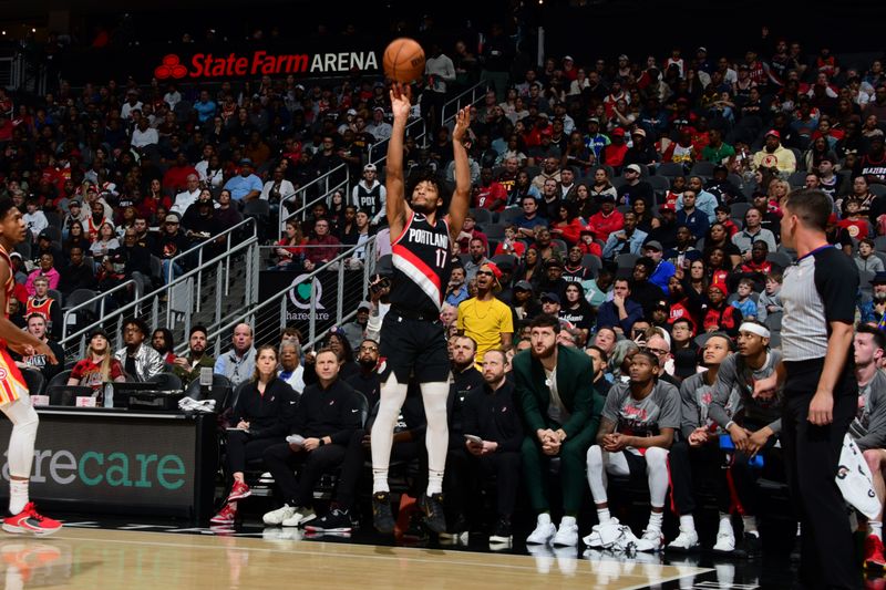 ATLANTA, GA - MARCH 3: Shaedon Sharpe #17 of the Portland Trail Blazers shoots the ball during the game against the Atlanta Hawks on March 3, 2023 at State Farm Arena in Atlanta, Georgia.  NOTE TO USER: User expressly acknowledges and agrees that, by downloading and/or using this Photograph, user is consenting to the terms and conditions of the Getty Images License Agreement. Mandatory Copyright Notice: Copyright 2023 NBAE (Photo by Scott Cunningham/NBAE via Getty Images)