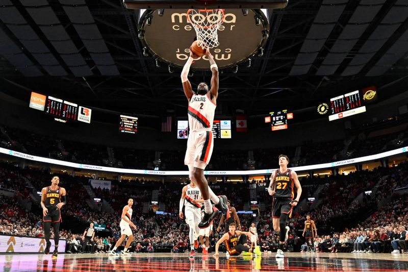 PORTLAND, OREGON - MARCH 13: Deandre Ayton #2 of the Portland Trail Blazers dunks the ball during the second quarter of the game against the Atlanta Hawks at the Moda Center on March 13, 2024 in Portland, Oregon. The Portland Trail Blazers won 106-102. NOTE TO USER: User expressly acknowledges and agrees that, by downloading and or using this photograph, User is consenting to the terms and conditions of the Getty Images License Agreement. (Photo by Alika Jenner/Getty Images)