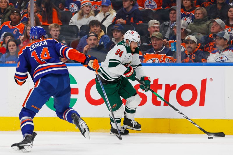 Nov 21, 2024; Edmonton, Alberta, CAN; Minnesota Wild forward Jakub Lauko (94) carries the puck around Edmonton Oilers defensemen Mattias Ekholm (14) during the second period at Rogers Place. Mandatory Credit: Perry Nelson-Imagn Images