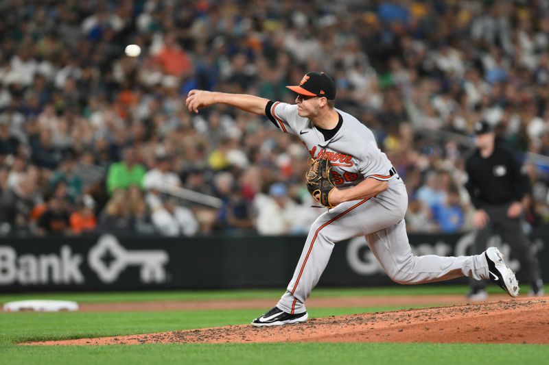 Aug 11, 2023; Seattle, Washington, USA; Baltimore Orioles relief pitcher Jacob Webb (66) pitches to the Seattle Mariners during the sixth inning at T-Mobile Park. Mandatory Credit: Steven Bisig-USA TODAY Sports