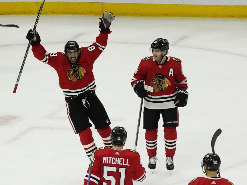 Jan 22, 2023; Chicago, Illinois, USA; Chicago Blackhawks defenseman Ian Mitchell (51) celebrates his goal against the Los Angeles Kings during the third period at United Center. Mandatory Credit: David Banks-USA TODAY Sports