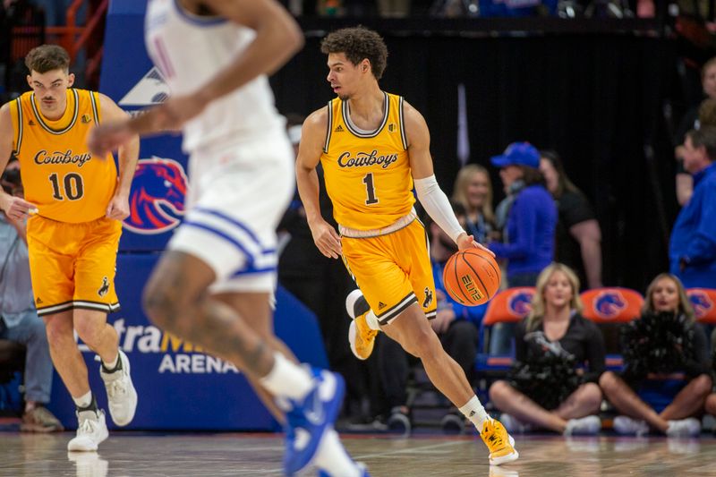 Feb 11, 2023; Boise, Idaho, USA; Wyoming Cowboys guard Brendan Wenzel (1) dribbles during the first half against the Boise State Broncos at ExtraMile Arena. Mandatory Credit: Brian Losness-USA TODAY Sports
