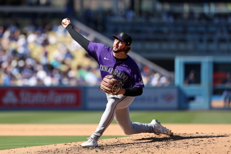 Sep 22, 2024; Los Angeles, California, USA;  Colorado Rockies relief pitcher Jeff Criswell (46) pitches during the sixth inning against the Los Angeles Dodgers at Dodger Stadium. Mandatory Credit: Kiyoshi Mio-Imagn Images