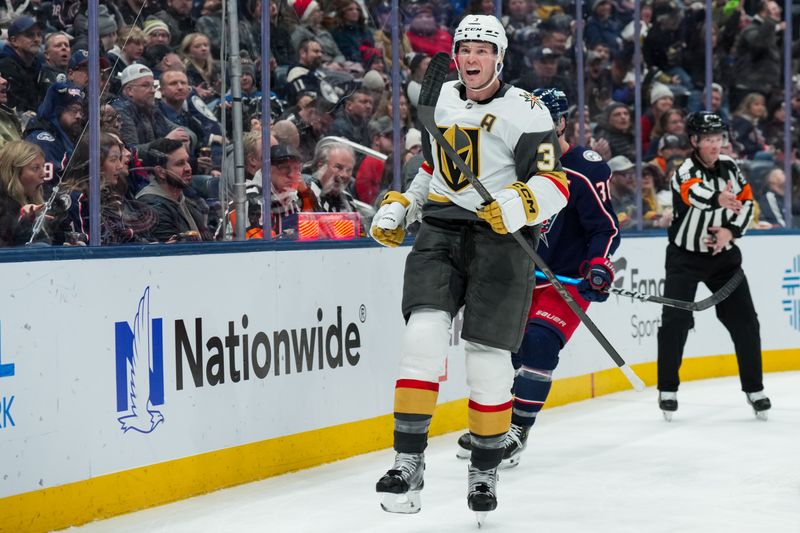 Dec 13, 2025; Columbus, Ohio, USA;  Vegas Golden Knights defenseman Brayden McNabb (3) celebrates scoring a goal against the Columbus Blue Jackets in the third period at Nationwide Arena. Mandatory Credit: Aaron Doster-Imagn Images